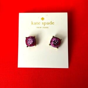 Kate Spade pink sparkly studs for pierced ears.